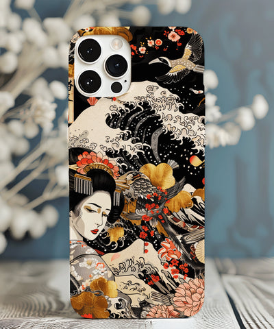 A Japanese-inspired phone case featuring a graceful geisha surrounded by ocean waves, cranes, and golden florals on a black background, blending traditional ukiyo-e art with modern elegance.