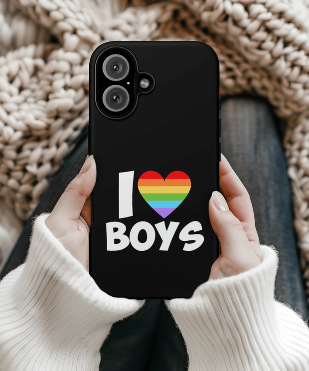 A black phone case with bold white text reading “I ❤️ Boys,” featuring a rainbow-striped heart symbol representing LGBTQ+ pride and celebration of queer love.