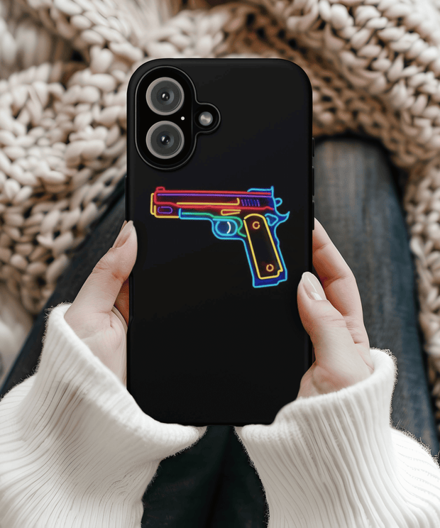 Black phone case featuring a vibrant neon outline of a handgun in rainbow colors. The glowing design contrasts sharply with the dark background, giving it a bold cyberpunk and edgy aesthetic.