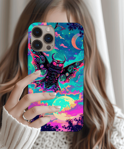 A vibrant phone case featuring a neon mothman creature with glowing pink eyes and detailed psychedelic wings flying over a colorful night sky with a crescent moon and glowing clouds in electric teal, magenta, and violet tones.