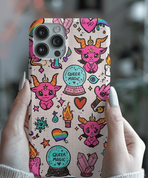 Colorful phone case featuring doodles of pink horned creatures, rainbow hearts, crystals, and crystal balls labeled “Queer Magic.” The whimsical witchy art on a grid background mixes pride, fantasy, and cute gothic charm - perfect for LGBTQ+ and magical aesthetic lovers.