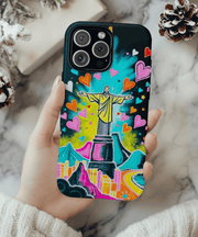 Bright Rio de Janeiro phone case featuring a neon pop art depiction of the Christ the Redeemer statue surrounded by pink, orange, and blue hearts with a glowing skyline and Sugarloaf Mountain. A bold, joyful design perfect for travel lovers and Brazil fans.