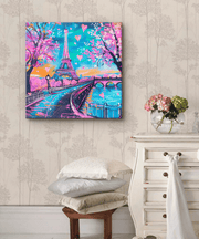 Colorful canvas art featuring the Eiffel Tower in bright neon shades of pink, turquoise, and lavender, with heart accents and a dreamy sunset sky. The romantic Paris scene captures a whimsical, modern vibe perfect for aesthetic home décor or travel lovers.