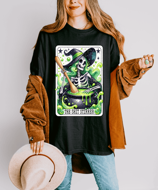The Shit Stirrer Witch Skeleton Comfort Colors Tee LavenderCeleste